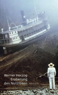 Buchcover: Werner Herzog. Die Eroberung des Nutzlosen. Carl Hanser Verlag, München, 2004.